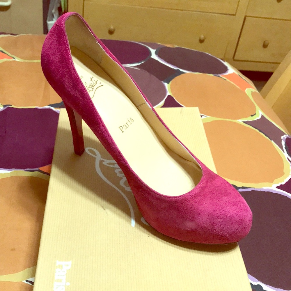 Pink suede Christian Louboutin pumps